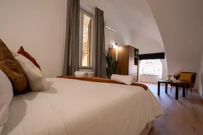 Letto o letti in una camera di Parthenope Luxury Suite in the center of Naples