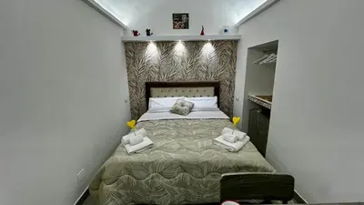 Letto o letti in una camera di Sweet home Serena