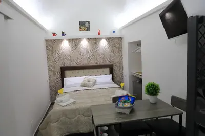 Letto o letti in una camera di Sweet home Serena