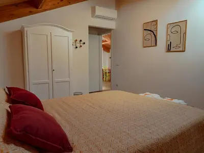 Letto o letti in una camera di Wind Rose - Ventaglieri Terrace