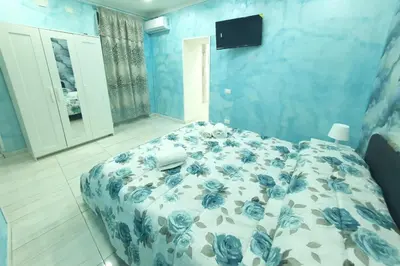 Letto o letti in una camera di Le coccole al Duomo