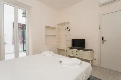 Letto o letti in una camera di I tre Santi by Dimorra
