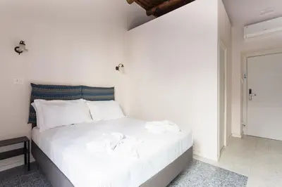 Letto o letti in una camera di I tre Santi by Dimorra