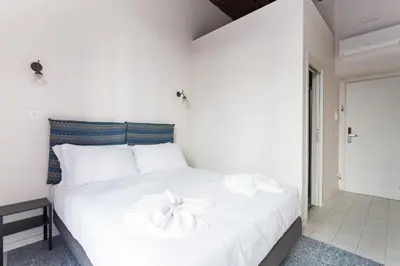 Letto o letti in una camera di I tre Santi by Dimorra