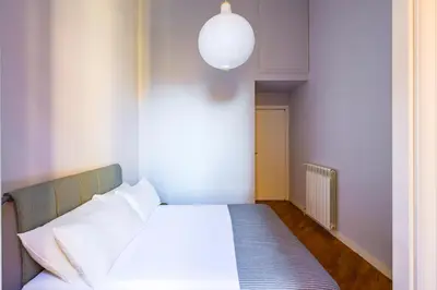 Letto o letti in una camera di Harmony Elegant Apartment with Parking