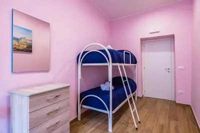 Letto o letti in una camera di Muzy flat at Capuana by NapoliApartments