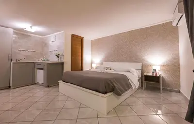 Letto o letti in una camera di Chiaia Partenopeo
