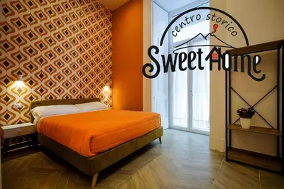 Letto o letti in una camera di SweetHome CentroStorico