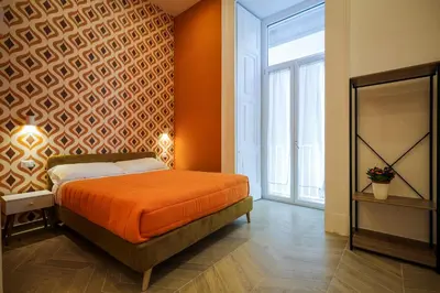 Letto o letti in una camera di SweetHome CentroStorico