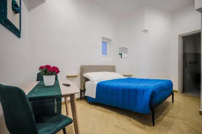 Letto o letti in una camera di SweetHome CentroStorico