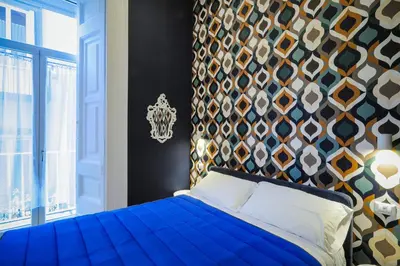 Letto o letti in una camera di SweetHome CentroStorico