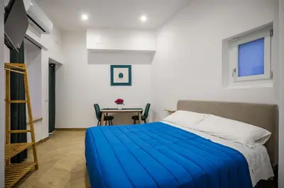 Letto o letti in una camera di SweetHome CentroStorico