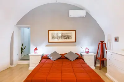 Letto o letti in una camera di O Panaro Lucky Flat by NapoliApartments