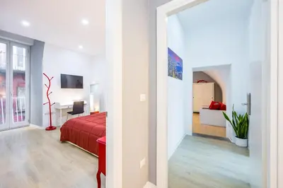 Letto o letti in una camera di O Panaro Lucky Flat by NapoliApartments