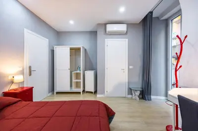 Letto o letti in una camera di O Panaro Lucky Flat by NapoliApartments