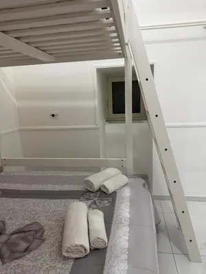 Letto o letti in una camera di House Lazzi