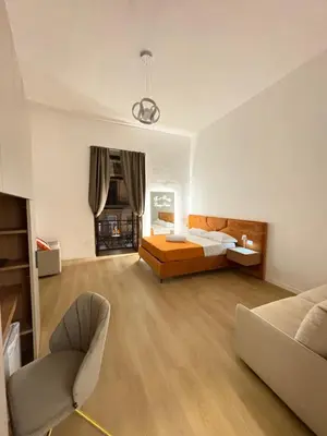 Letto o letti in una camera di Le 2 sorelle Luxury Rooms