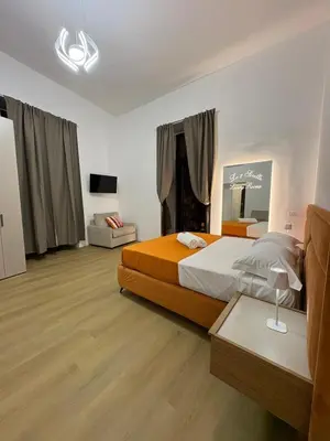 Letto o letti in una camera di Le 2 sorelle Luxury Rooms