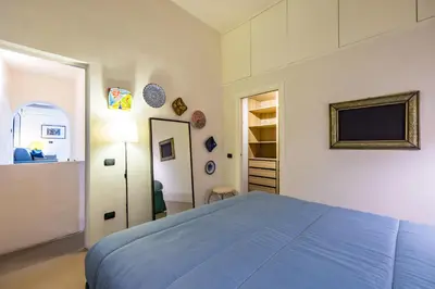 Letto o letti in una camera di Nilo Boutique Terrace by NapoliApartments