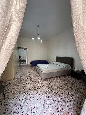 Letto o letti in una camera di Maison Spaccanapoli