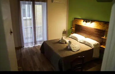 Letto o letti in una camera di La Coccinella 2025