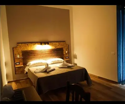 Letto o letti in una camera di La Coccinella 2025