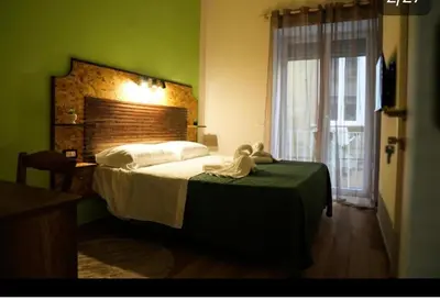 Letto o letti in una camera di La Coccinella 2025