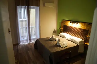 Letto o letti in una camera di La Coccinella 2025