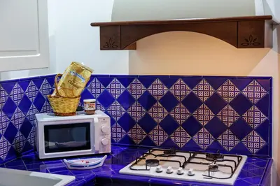 Cucina o angolo cottura di Bellini Inn Primo Piano
