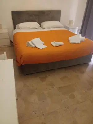 Letto o letti in una camera di Ulisse 1