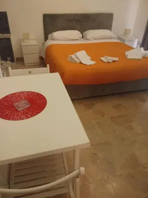 Letto o letti in una camera di Ulisse 1