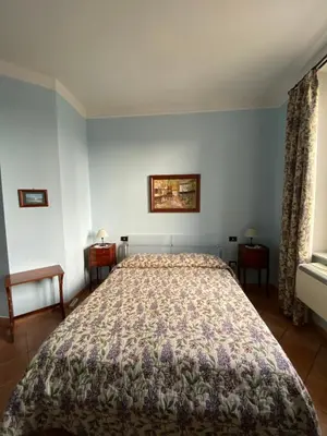 Letto o letti in una camera di B&b la stufa