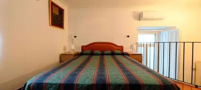 Letto o letti in una camera di Domus Petrucci with Terrace