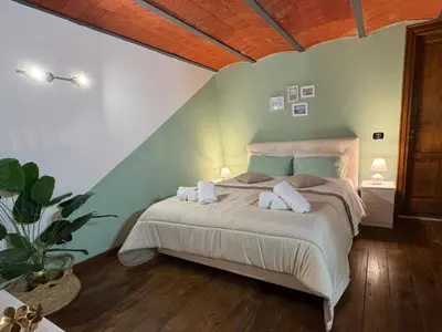 Letto o letti in una camera di Maison Brigitte Napoli