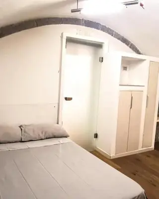 Letto o letti in una camera di Vecchia Napoli Santa Maria la Nova