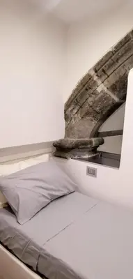 Letto o letti in una camera di Vecchia Napoli Santa Maria la Nova