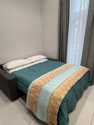 Letto o letti in una camera di Garibaldi Apartment