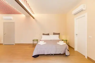 Letto o letti in una camera di Marilyn Apartment Piazza Bellini
