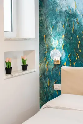Letto o letti in una camera di Le Corti del Re Tappia