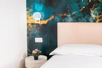 Letto o letti in una camera di Le Corti del Re Tappia