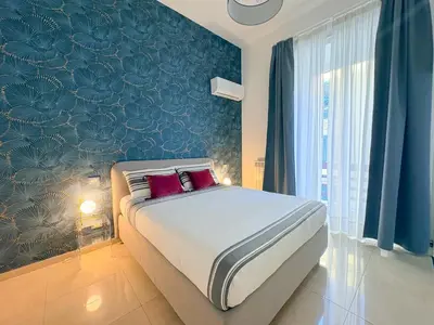 Letto o letti in una camera di Feel Napoli nuovo, comodo, centrale e a 2 min dalla Metro!