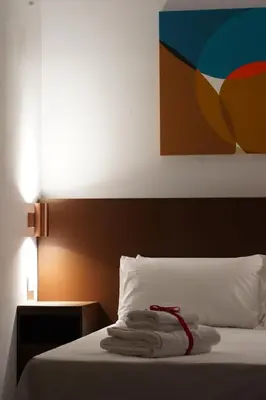 Letto o letti in una camera di Rooms Around