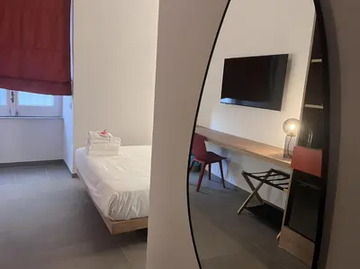 Letto o letti in una camera di Rooms Around