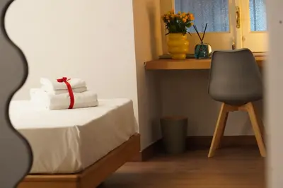 Letto o letti in una camera di Rooms Around