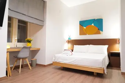 Letto o letti in una camera di Rooms Around