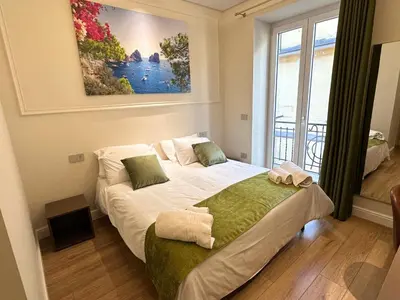 Letto o letti in una camera di A casa tua