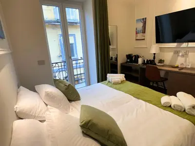 Letto o letti in una camera di A casa tua