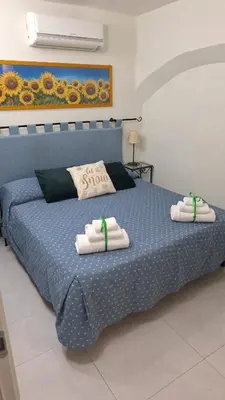 Letto o letti in una camera di House Casarella