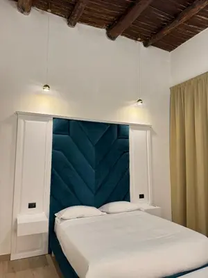 Letto o letti in una camera di Chiaia Lifestyle Suite