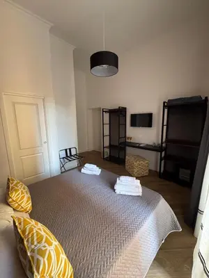 Letto o letti in una camera di La Boutique del Centro